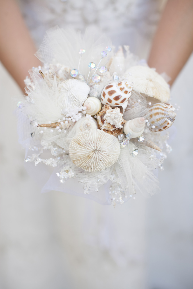 Gorgeous Seashell Bridal Bouquet | The Majestic Vision Wedding Planning | Villas Mar Azure in Ponce, PR | www.themajesticvision.com | Shay Cochrane Photography
