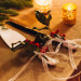 Elegant Christmas Themed Wedding Cake Cutter at Fairchild Tropical Garden in Coral Gables, FL thumbnail