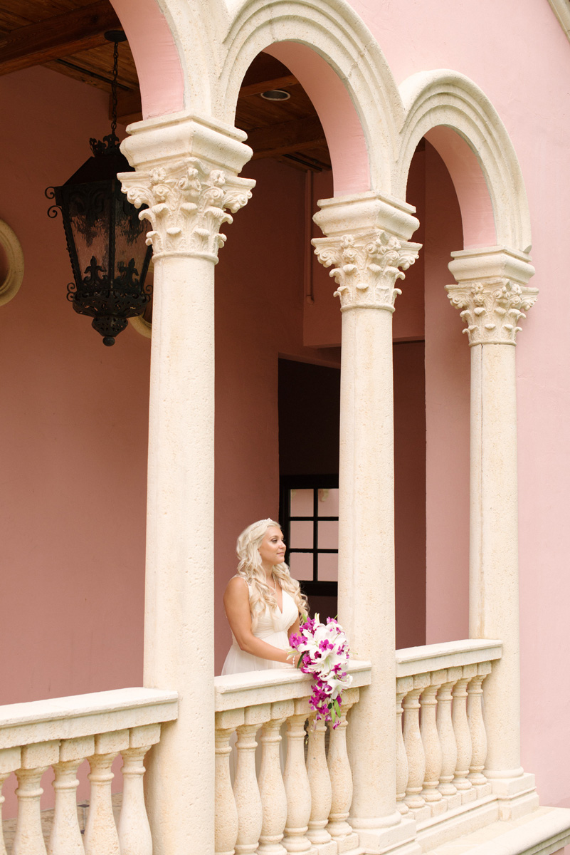 Elegant Bridal Portrait with Stunning Cascade Bridal Bouquet with Purple Orchids and White Lillies | The Majestic Vision Wedding Planning | The Addison Boca in Palm Beach, FL | www.themajesticvision.com | Starfish Studios