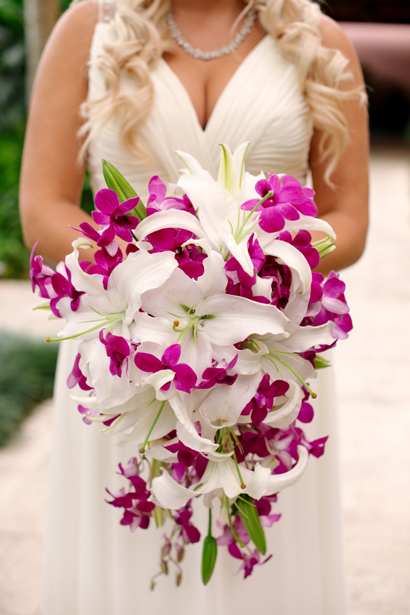 Stunning Cascade Bridal Bouquet with Purple Orchids and White Lillies | The Majestic Vision Wedding Planning | The Addison Boca in Palm Beach, FL | www.themajesticvision.com | Starfish Studios