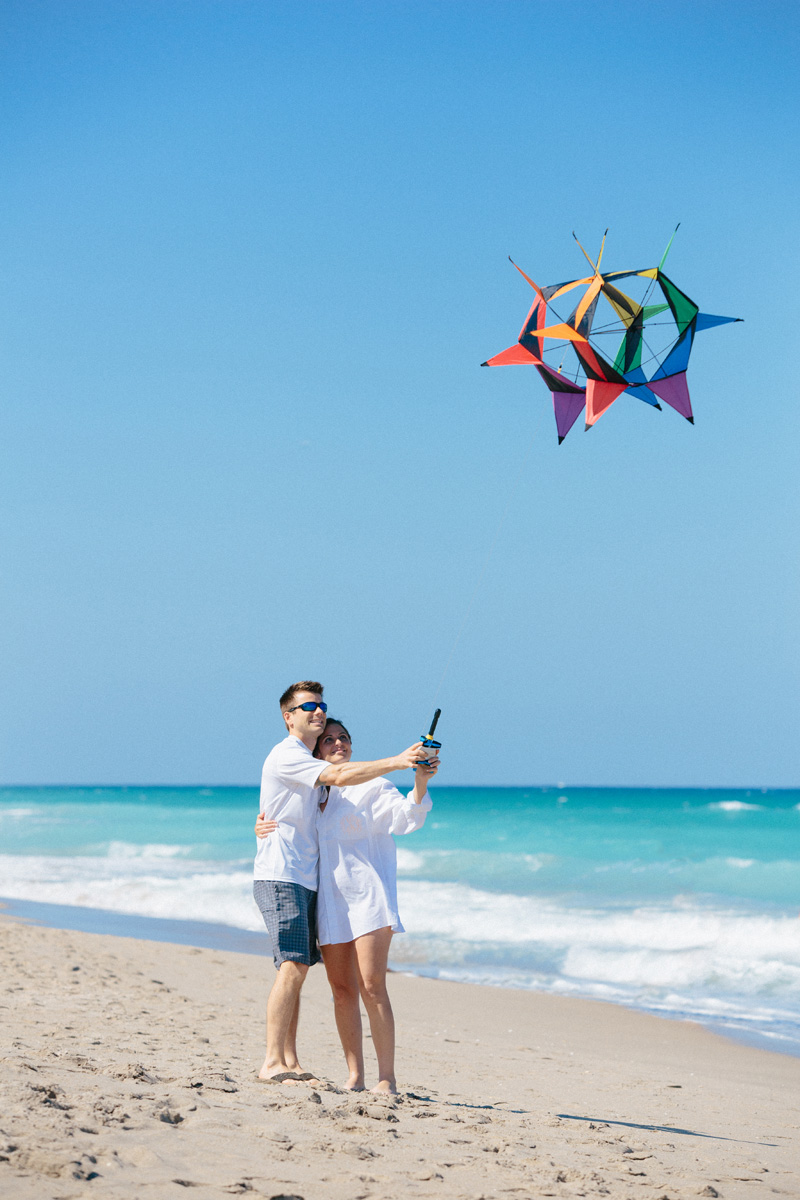 Fun Bridal Portrait on the Beach while Flying a Kite | The Majestic Vision Wedding Planning | Marriott Singer Island in Palm Beach, FL | www.themajesticvision.com | Robert Madrid Photography