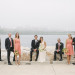 Elegant Bridal Party Portrait with Milwaukee Art Museum Background at Pritzlaff Building in Milwaukee, WI thumbnail