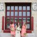 Elegant Bridal Party Portrait with Brick Background at Pritzlaff Building in Milwaukee, WI thumbnail