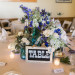 Elegant Centerpiece with Wildflowers, Blue Hydrangea and Cream Roses at Sailfish Marina in Palm Beach, FL thumbnail