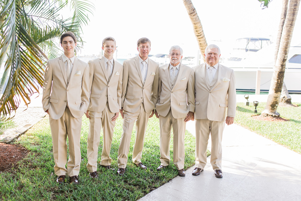 Elegant Bridal Party in Cream Suits | The Majestic Vision Wedding Planning | Sailfish Marina in Palm Beach, FL | www.themajesticvision.com | Chris Kruger Photography