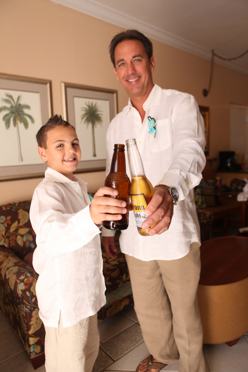 Handsome Groom Getting Ready with Ring Bearer | The Majestic Vision Wedding Planning | Palm Beach Shores in Palm Beach, FL | www.themajesticvision.com | Krystal Zaskey Photography