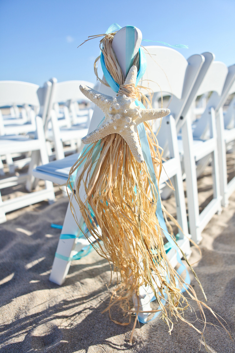 Elegant Starfish Aisle Markers for Beach Ceremony | The Majestic Vision Wedding Planning | Palm Beach Shores in Palm Beach, FL | www.themajesticvision.com | Krystal Zaskey Photography