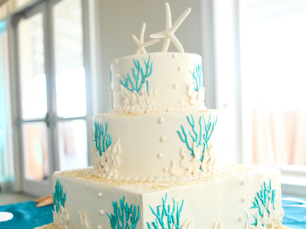 Whimsical Wedding Cake with Coral and Starfish | The Majestic Vision Wedding Planning | Palm Beach Shores in Palm Beach, FL | www.themajesticvision.com | Krystal Zaskey Photography