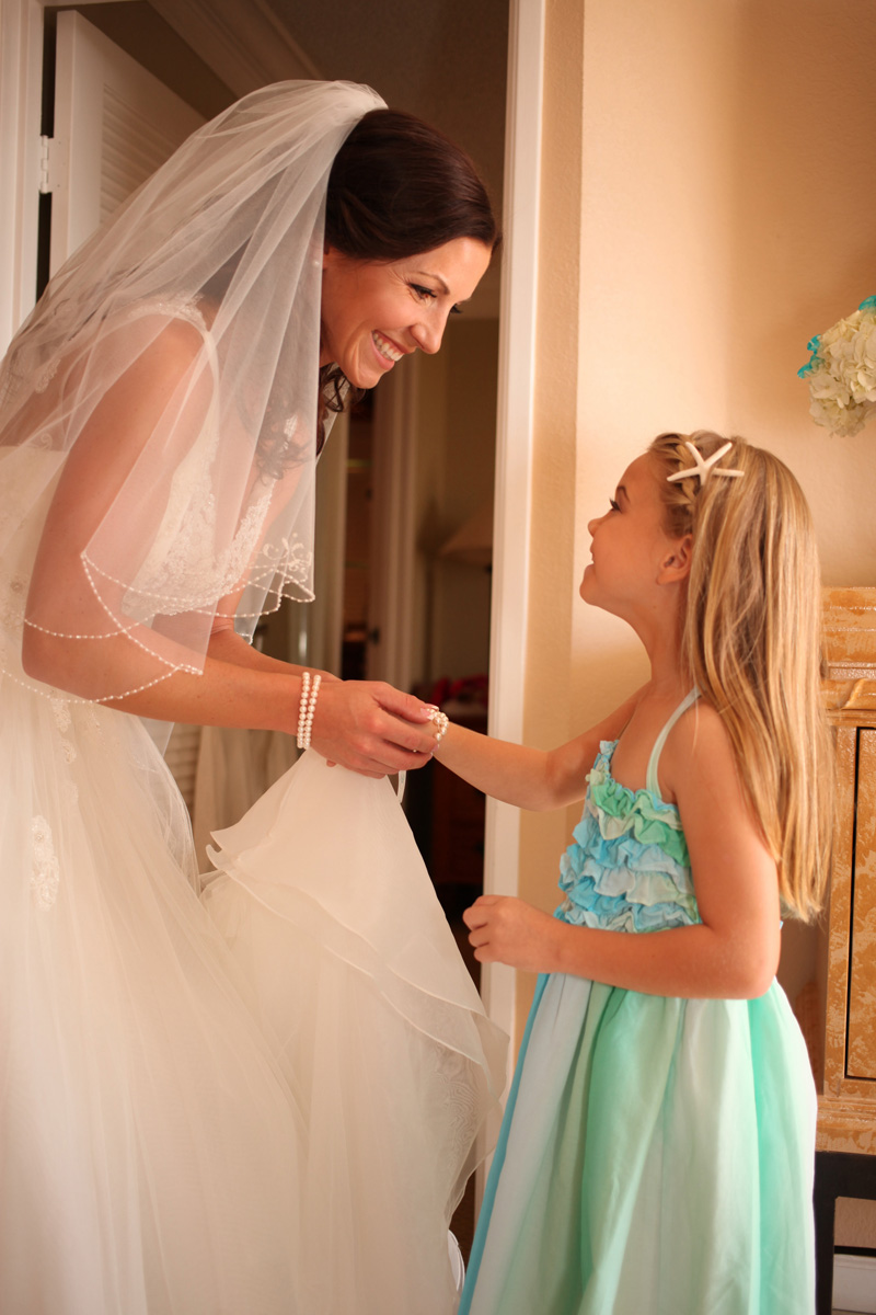 Elegant Bride Getting Ready with Flower Girl | The Majestic Vision Wedding Planning | Palm Beach Shores in Palm Beach, FL | www.themajesticvision.com | Krystal Zaskey Photography