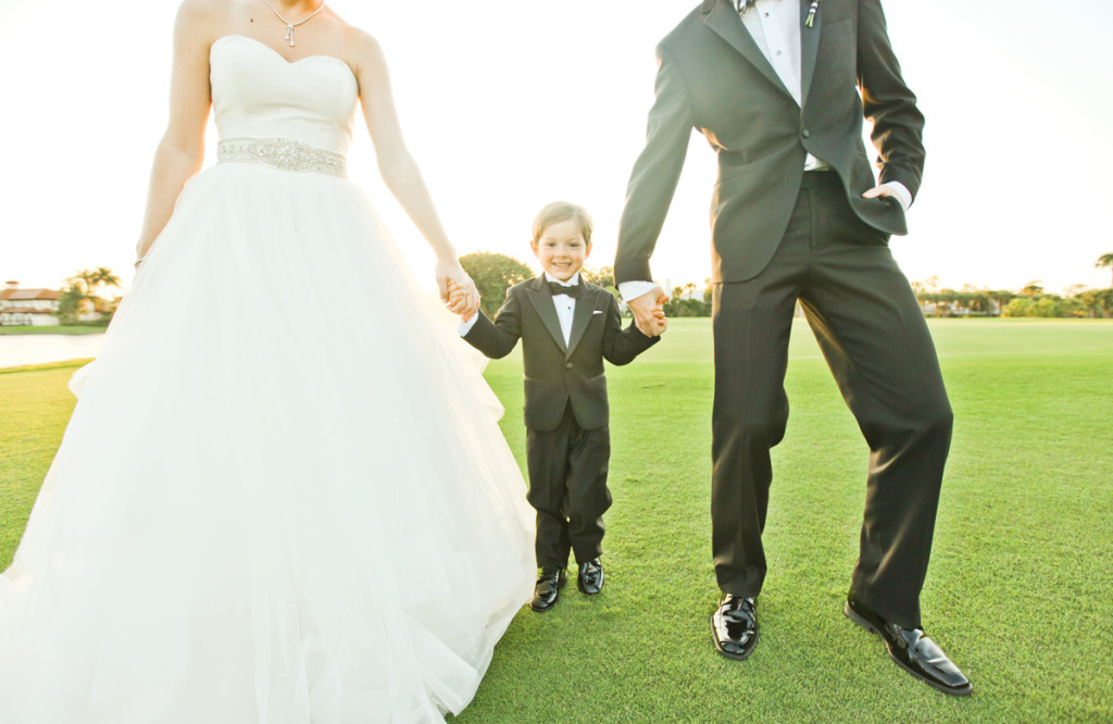 Adorable Ring Bearer with Bride and Groom on Golf Course | The Majestic Vision Wedding Planning | Breakers West in Palm Beach, FL | www.themajesticvision.com | Krystal Zaskey Photography