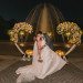 Romantic Heart Shaped Ceremony Arch Covered in Orange, Yellow and White Roses at Palm Beach Zoo in Palm Beach, FL thumbnail